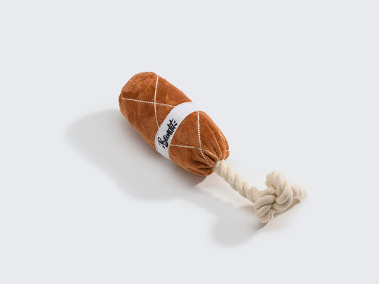 Hundespielzeug in Wurstform