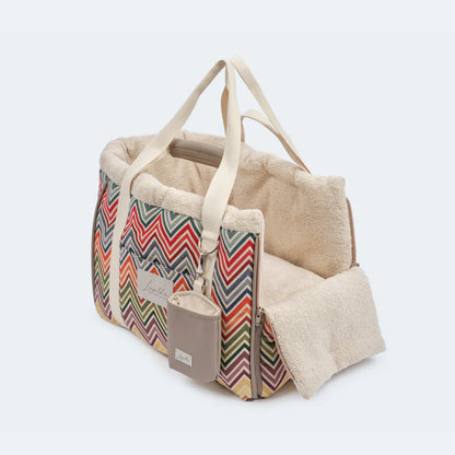 Hochwertige Hundetasche von Leopolds in beige Tönen mit bunten Details. Innen, superweiches Plüsch für extra Komfort.